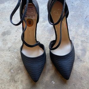 These are Jessica Simpson heels , they are black with gold zipper pieces ,size 8